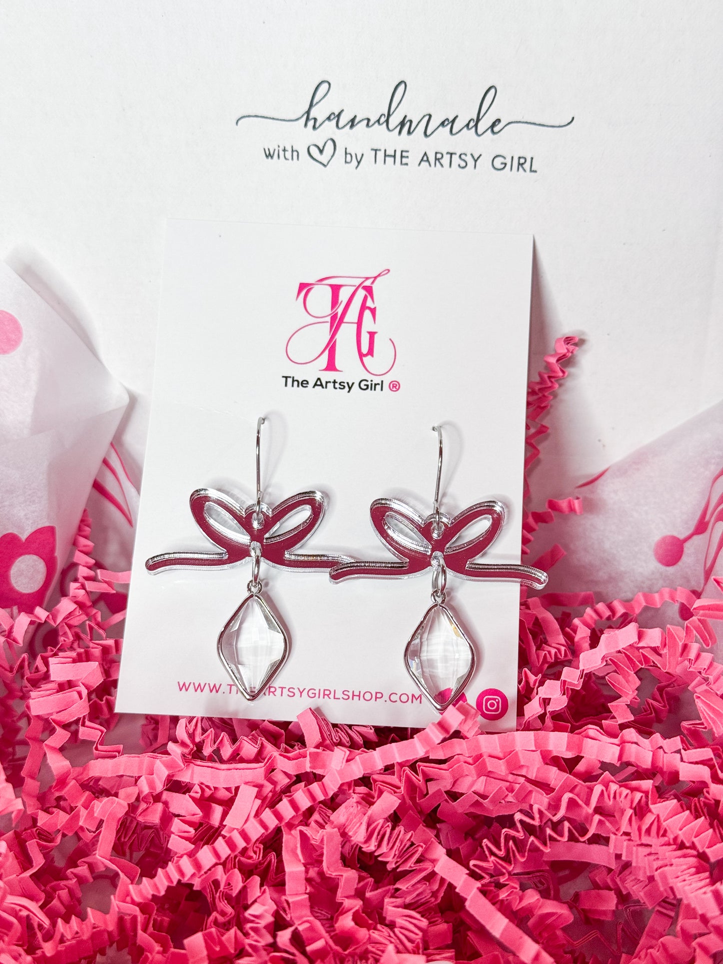 Silver Bow drop earrings