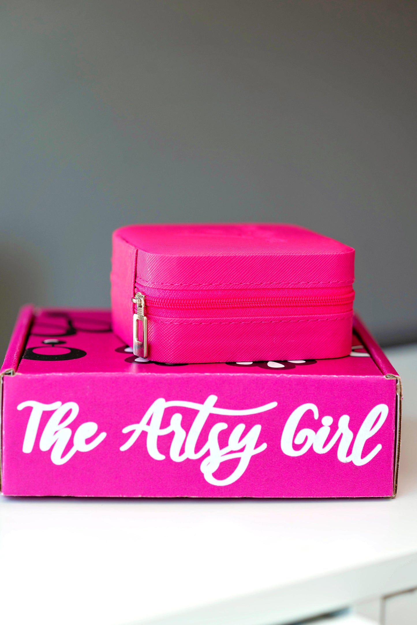 The ‘Take Me With You’ Travel Jewelry Case is a stylish and elegant accessory, perfect for organizing and protecting jewelry on the go. Made from high-quality PU leather with The Artsy Girl logo embossed on the front, it includes multiple compartments for rings, earrings, necklaces, and bracelets, and features a soft, velvety interior to prevent scratches. Ideal for travel and gifting.