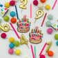 A customer favorite and conversation starter! Birthday Cake earrings adorned with bright, happy colors, featuring candle embellishments and a post back. Perfect for your next birthday celebration.