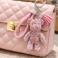 Miss Sparkle Bear crystal teddy bear bag charm with wristlet loop and tassel detail