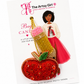 Decorative bag with candy design on a branded card featuring 'The Artsy Girl' logo.