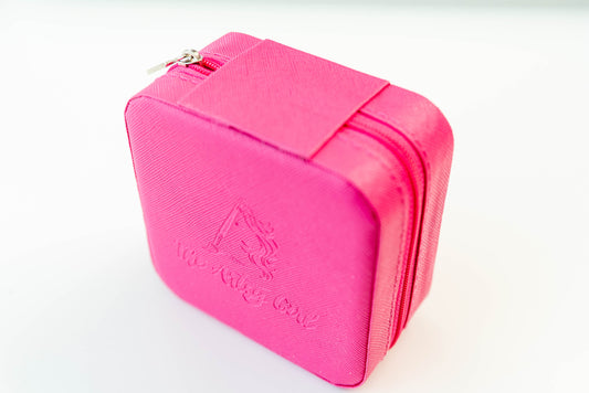 The ‘Take Me With You’ Travel Jewelry Case is a stylish and elegant accessory, perfect for organizing and protecting jewelry on the go. Made from high-quality PU leather with The Artsy Girl logo embossed on the front, it includes multiple compartments for rings, earrings, necklaces, and bracelets, and features a soft, velvety interior to prevent scratches. Ideal for travel and gifting.