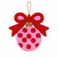 A beaded Christmas ornament shaped like a round bauble with a large red bow on top, hanging from a gold string. The ornament is made of pink and red seed beads with red polka dots on a pink background.
