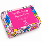 Sparkle Energy affirmation card box by The Artsy Girl with colorful floral artwork and a hot pink label on white.