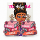 Pink and orange beaded book-stack earrings reading “Book Club Girlie,” with crystal flower tops, on an illustrated Artsy Girl card.
