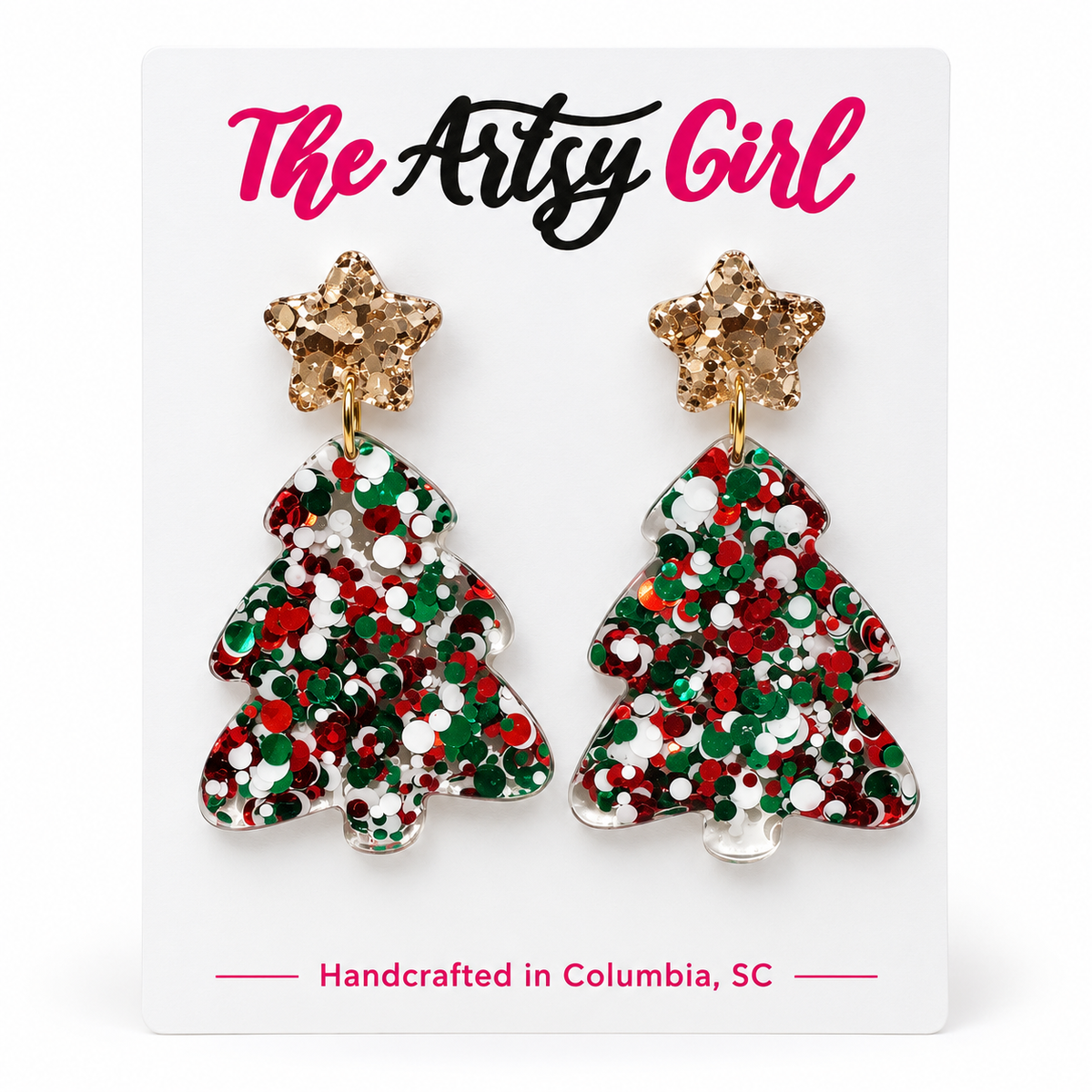 Red, green, and white confetti Christmas tree earrings with gold glitter star studs on The Artsy Girl display card.