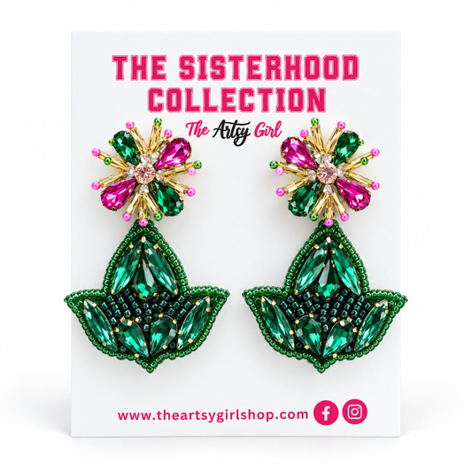 Emerald green beaded ivy leaf earrings with pink and green rhinestone tops on The Artsy Girl Sisterhood Collection card.