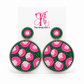 Round pink and green beaded leopard earrings with silver edging displayed on The Artsy Girl card.