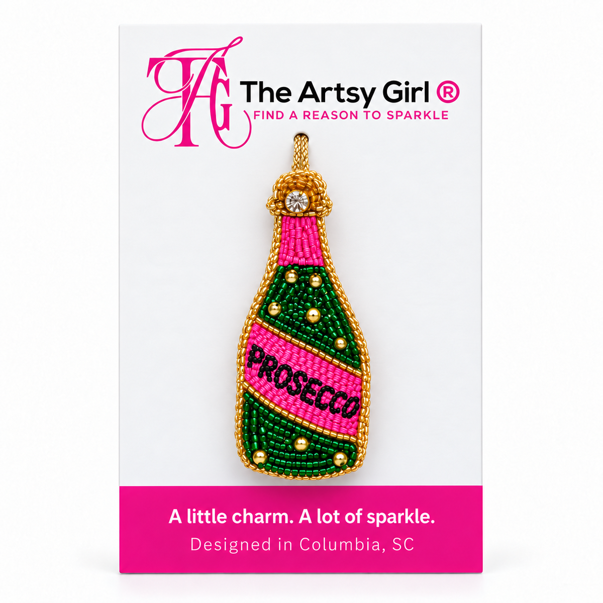 Pink and green beaded Prosecco bottle charm with gold trim displayed on The Artsy Girl packaging card.