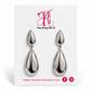Polished silver double-teardrop earrings displayed on a white Artsy Girl card.
